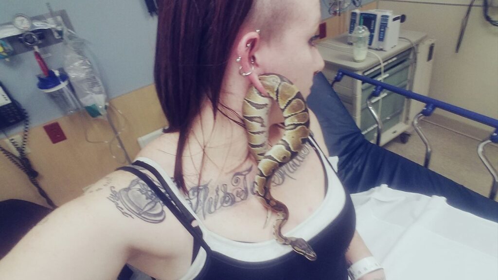 Woman Gets Pet PYTHON Stuck In Her Earlobe! Woman Gets Pet Python Stuck in Ear